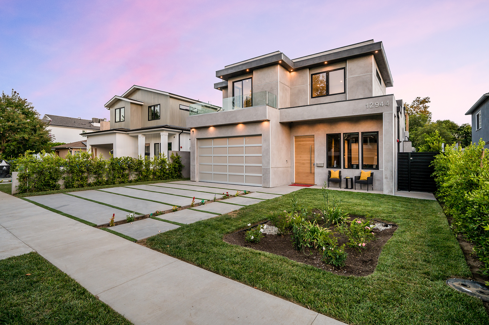 Encino flat roof home with front balcony
